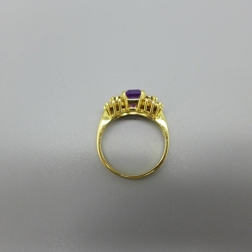 954 - An 18ct gold, amethyst and diamond ring, 4.9g, N
