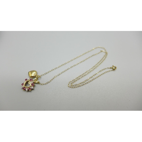 962 - A 9ct gold, ruby and diamond pendant and chain, 1.7g