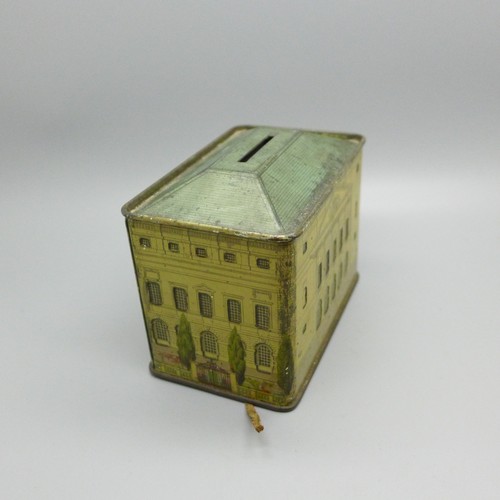 914 - A Cauldon Potteries Limited The Queen's Dolls' House money box tin and an Oxo George VI Coronation s... 