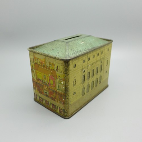 914 - A Cauldon Potteries Limited The Queen's Dolls' House money box tin and an Oxo George VI Coronation s... 