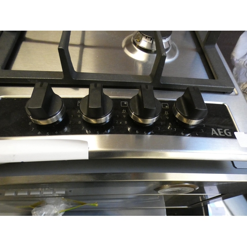 57 - AEG  Gas 4 Burner Hob H40xW594xD510 - model no:- HG654550SY, RRP £257.5 inc. VAT * This lot is subje... 