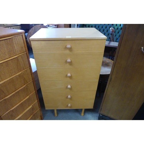 107 - A teak chest of drawers