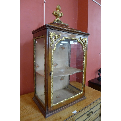 117 - An 18th Century French stained pine and gilt gesso table top cabinet