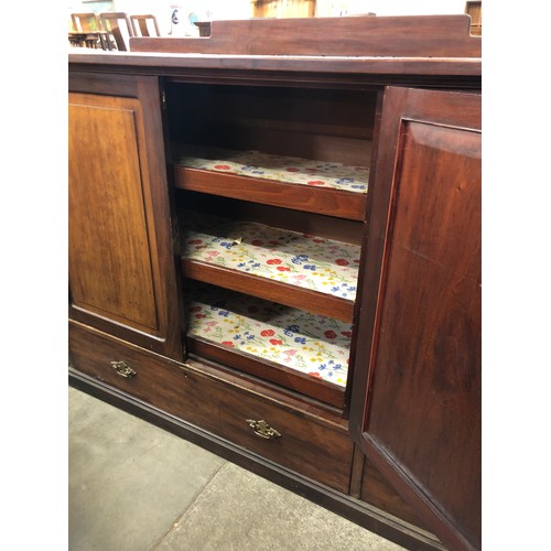 118 - A George III mahogany two door press cupboard