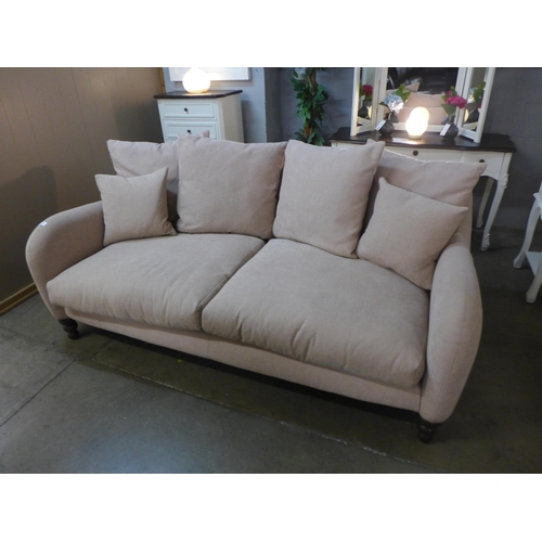 1407 - A designer pink upholstered two seater sofa (marks)