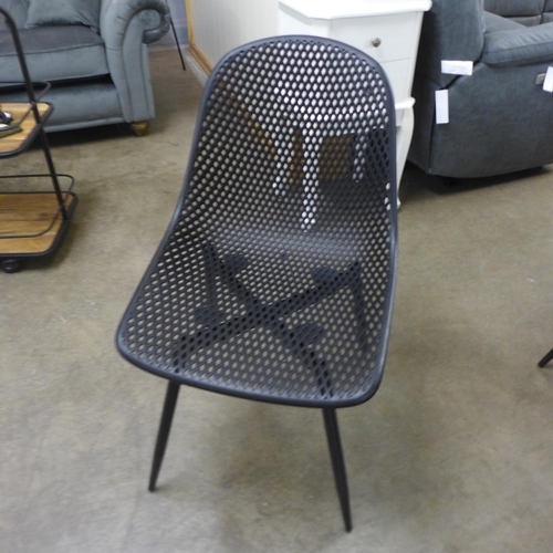 1422 - A  set of four Aswin chairs with black legs