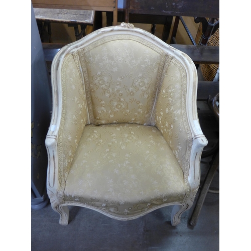 144 - A French painted and fabric upholstered fauteuil