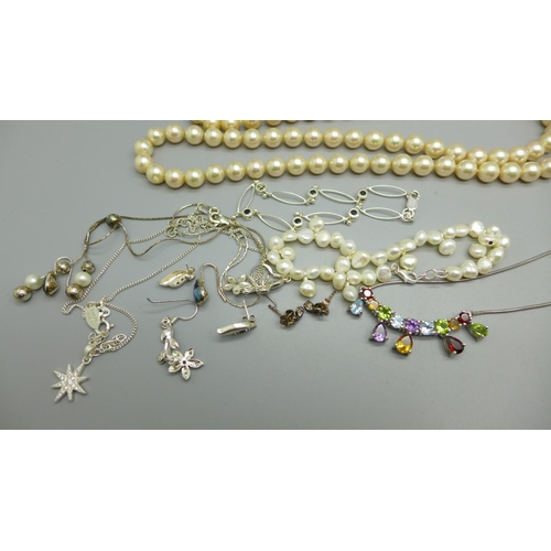 1182 - A collection of silver jewellery and silver mounted jewellery