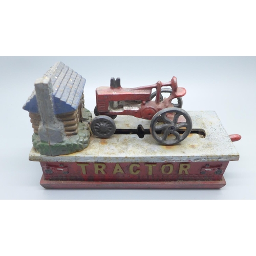 1187 - A cast metal tractor money box