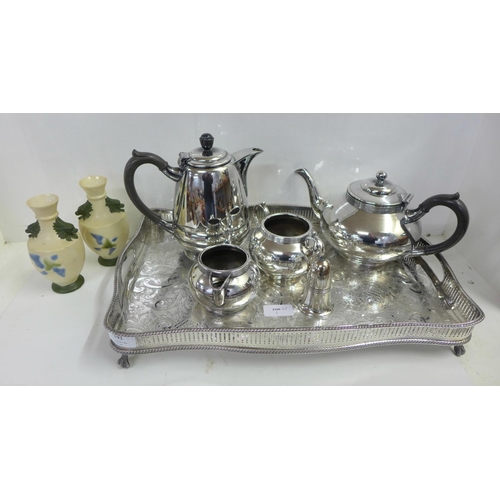 1191 - A collection of silver plated items including a tray, a teapot, cream and sugar, a Walker & Hall cof... 