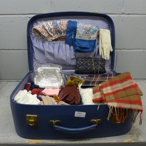 1205 - A vintage Antler suitcase with a collection of scarves including one Liberty print, silk and Pringle... 