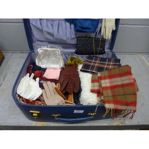 1205 - A vintage Antler suitcase with a collection of scarves including one Liberty print, silk and Pringle... 