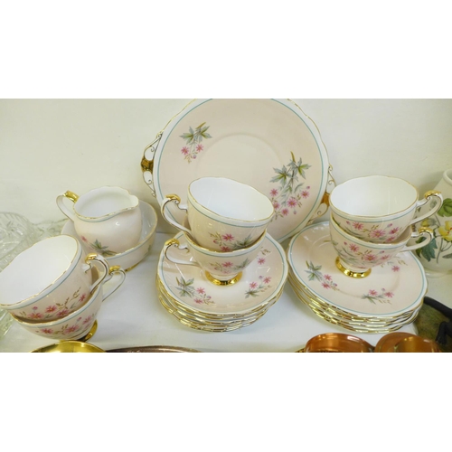 1218 - A Roslyn tea set, six setting, a collection of metal ware including brass, a glass dressing table se... 