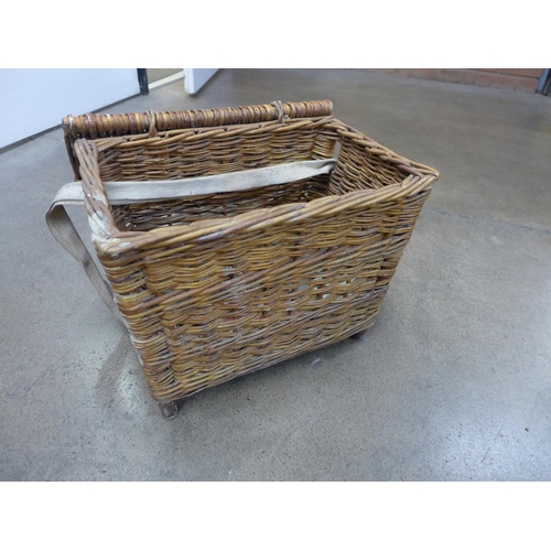 1234 - A fishing basket containing floats and a reel **PLEASE NOTE THIS LOT IS NOT ELIGIBLE FOR POSTING AND... 