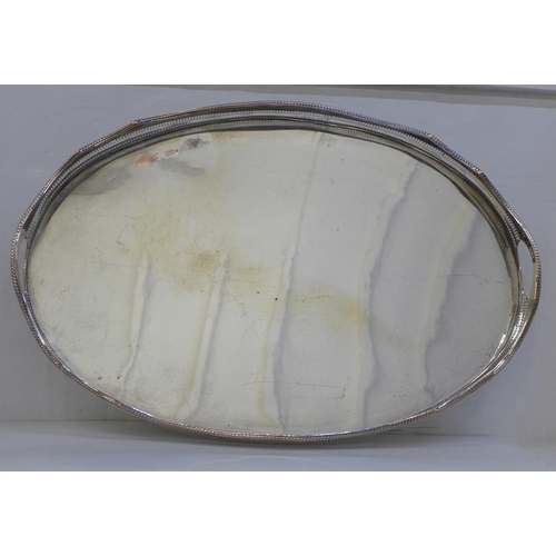 614 - A large oval silver plated gallery tray