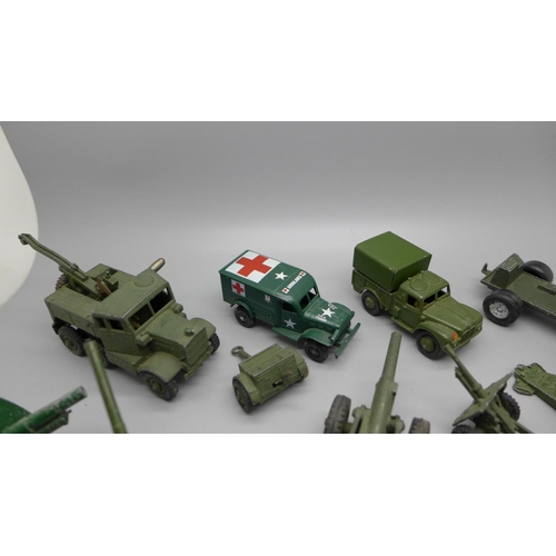 631 - A collection of Dinky Toys die-cast Field Guns and other military vehicles