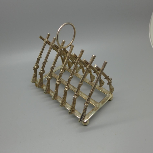 654 - Two EPNS toast racks, one in the style of Dr. Christopher Dresser and hard soldered, the other one w... 