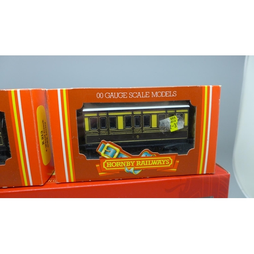 678 - A Hornby coach, R4669 and two wagons, R213 x2, boxed