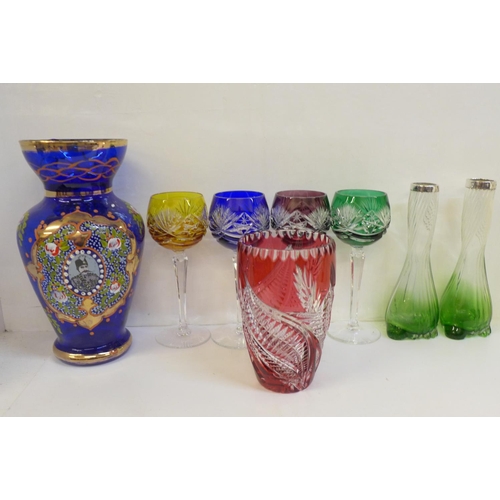 703 - Assorted glass including a pair of silver topped vases and four coloured hock glasses