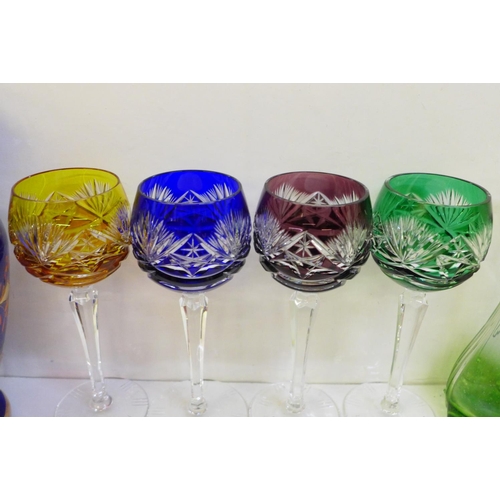 703 - Assorted glass including a pair of silver topped vases and four coloured hock glasses