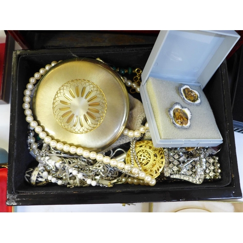 704 - A jewellery cabinet with costume jewellery and two boxed wristwatches, Rotary and Avia