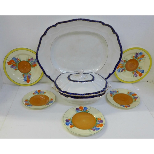 705 - Four Clarice Cliff Crocus pattern plates, a meat plate and tureen