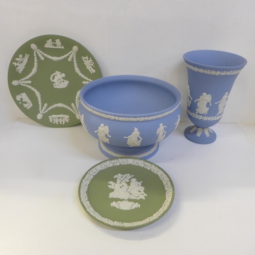 709 - Four items of Wedgwood Jasperware including The Hours vase and fruit bowl