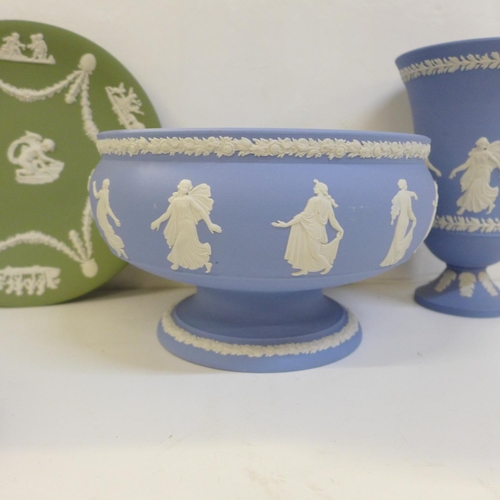 709 - Four items of Wedgwood Jasperware including The Hours vase and fruit bowl