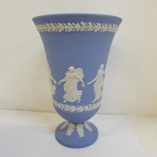 709 - Four items of Wedgwood Jasperware including The Hours vase and fruit bowl