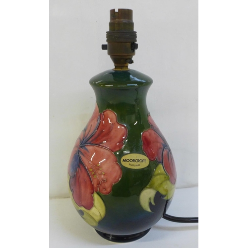 728 - A Moorcroft Hibiscus table lamp base, 20cm