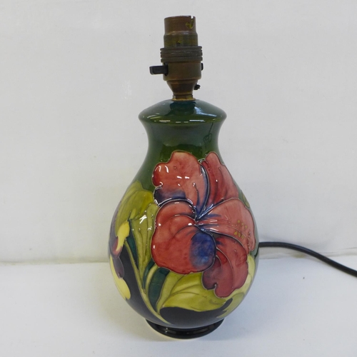 728 - A Moorcroft Hibiscus table lamp base, 20cm