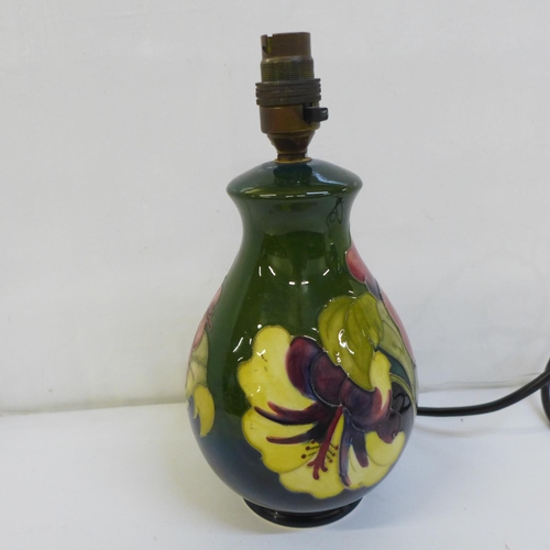 728 - A Moorcroft Hibiscus table lamp base, 20cm