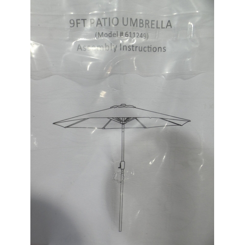 3027 - A grey fabric parasol * this lot is subject to VAT