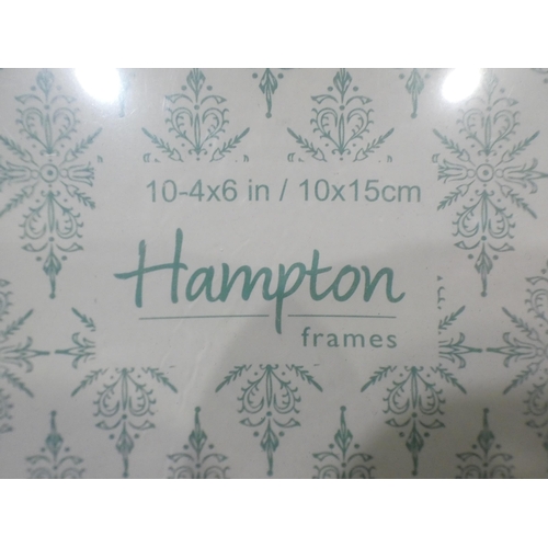 3048 - A white distressed photograph frame for 10 4x6