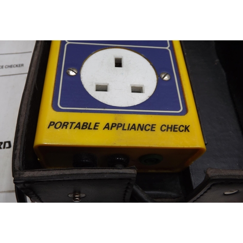 2105 - Seaward Pac 500 portable appliance checker with instructions, leads, leather case - boxed - W