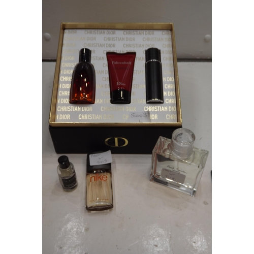 2115 - 4 Bottles of designer aftershave, 1 Dior box set, Paul Smith, Armani and Dior box set plus small bot... 