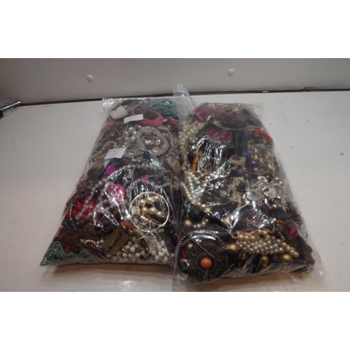 2123 - 2 Bags of costume jewellery - approx 300-350 pcs