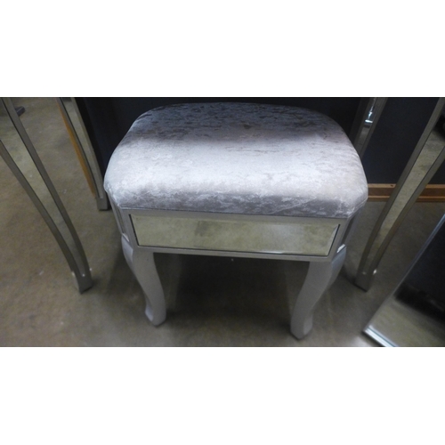 1371 - A mirrored dressing table and mirrored upholstered stool