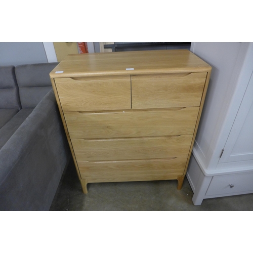 1505 - An oak chest of five drawers