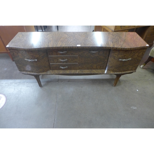 110 - A walnut effect sideboard