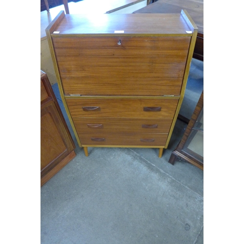 111 - A small teak bureau