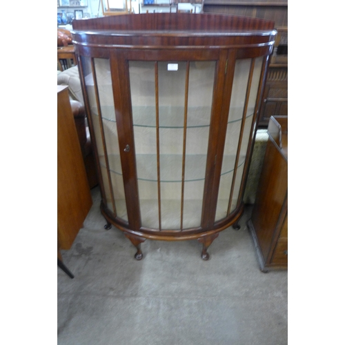 114 - A mahogany bow front display cabinet