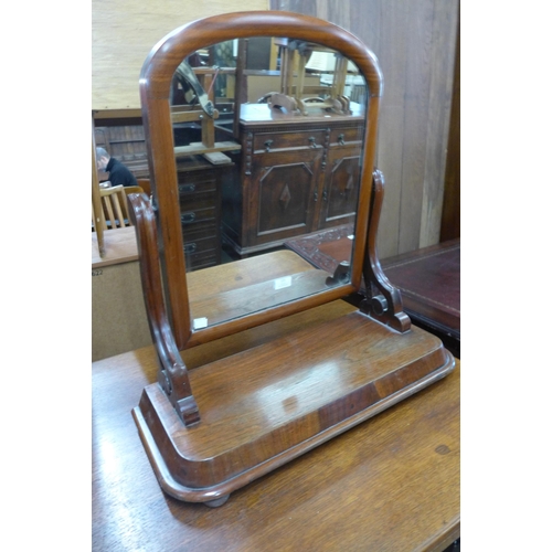 131 - A Victorian mahogany toilet mirror