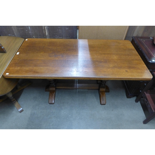 132 - An oak refectory table