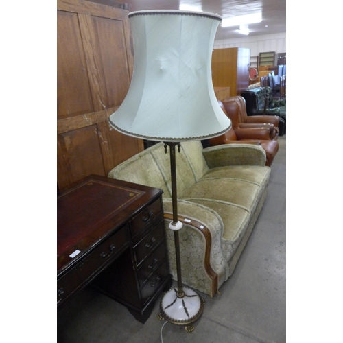 134 - An Italian style brass and marble floor standing lamp