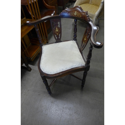 145 - An Edward VII inlaid mahogany elbow chair