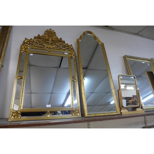 356 - Three gilt framed mirrors