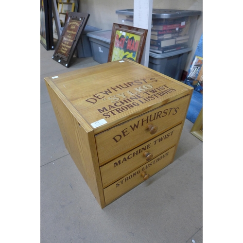 375 - A pine table top haberdashery shop cabinet, bearing Dewhursts Sylko inscription