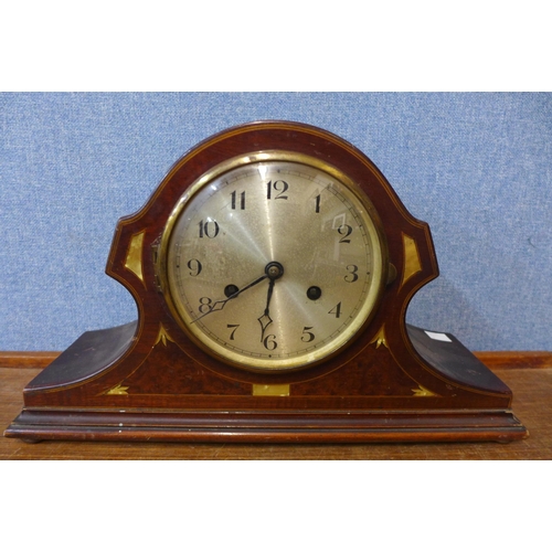 376 - An Art Nouveau inlaid mahogany mantel clock