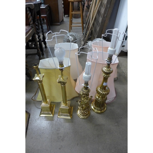 398 - Four brass table lamps